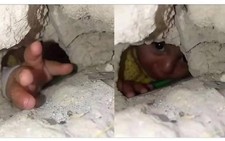 Sự thật về bức ảnh 'bé gái Palestine thò tay cầu cứu dưới đống đổ nát'