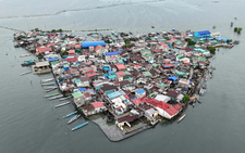 Against the tide: Filipinos battle rising sea on sinking island