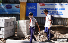 Sidewalk construction left in disarray around schools, hospitals in Ho Chi Minh City

