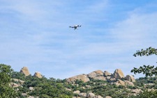 Programmed drones sow green seeds over Vietnam’s desert forest