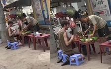 Too tall for plastic stool: Foreign diner’s awkward street food moment goes viral in Vietnam