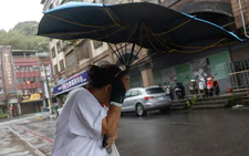 Typhoon Champi sweeps past Taiwan, leaving 1 dead, 500 injured