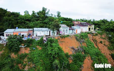 In Vietnam, plan to level landslide-prone mountain draws caution from experts