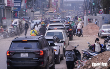 Hanoi residents cry foul as street expansion drags on, stirring dust, disruption ahead of Tet
