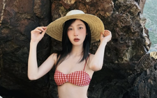 Vietnamese singer apologizes after controversial bikini photoshoot at well of 'spiritual significance'