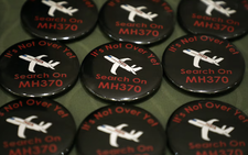 Families of flight MH370 passengers urge Malaysia to extend search