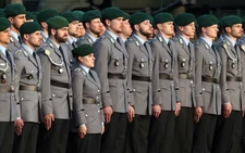 Germany works to clarify new rules on fighting-age men leaving country