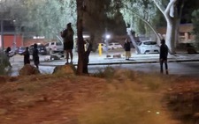 Protesters clash with Australian police after suspected killer of Indigenous girl arrested