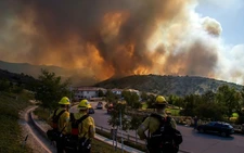Brush fire near Los Angeles forces thousands to evacuate