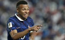 Mbappe scores twice as France beat Iraq at World Cup after two-hour storm delay
