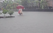 Torrential rain from passing storm shuts down parts of Taiwan and Japan