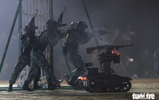Vietnam’s armed robots, elite police showcase counterterrorism tactics during public security games 