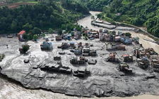 Hundreds killed, more than 1,000 missing in Nepal and China after Himalayan flood