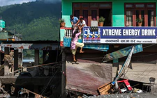 Rescuers battle floods and debris as Himalayan disaster death toll nears 800