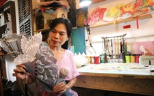 In Vietnam, craftswoman gives fallen leaves new life through intricate handmade fans