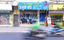 Le Loi Blvd in downtown Ho Chi Minh City hit by graffiti vandalism