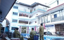 Laos arrests 8 Vietnamese nationals over suspected methanol poisoning deaths
