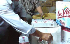Thị trường tết: Rượu giả, tem giả!