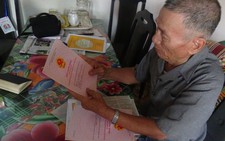 Cấm chuyển nhượng “sổ đỏ” khiến hộ gia đình 
