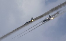 Mỹ - Nga cạnh tranh trên bầu trời Syria