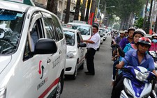 Xử phạt 7 hãng taxi không chịu giảm giá cước