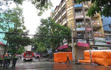 Bị ném bóng đèn khi cưỡng chế, chấp hành viên bị thương