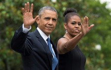 Vợ chồng Obama viết hồi ký kiếm 60 triệu USD