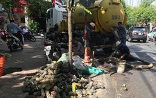 Lãnh đạo TP.HCM xin lỗi công nhân thoát nước