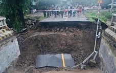 Nước lũ cuốn đứt đường đầu cầu, đường Trường Sơn Đông ách tắc