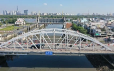 Ngày đầu cầu Tân Thuận 1 điều chỉnh tổ chức giao thông: Xe cộ đi lại ổn định