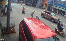 Cần phạt nặng người đi ô tô vứt rác, khạc nhổ ra đường