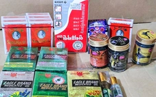 Bắt cặp vợ chồng sản xuất 70.000 chai 'dầu gió con ó' giả