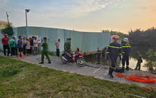 Tài xế GrabBike trượt chân xuống kênh, nước cuốn vào cống mất tích