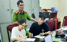 Cảnh sát dẫn giải Ngô Thị Thêu, vợ của Mr Hunter Lê Khắc Ngọ từ Thái Lan về Việt Nam