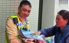 Bé trai 3,2kg chào đời ngay trên xe tuần tra của cảnh sát giao thông