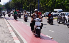 Xe máy chạy ào ào vào làn xe đạp Mai Chí Thọ