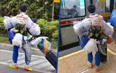 Cậu bé 14 tuổi vác 'núi' hành lý về quê ăn Tết khiến dân mạng thán phục