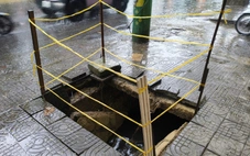 Giăng dây cảnh báo tại hố sụt khiến người đàn ông suýt rơi xuống cống