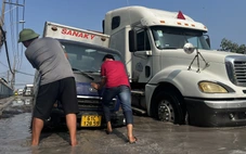 Đường Bến Nghé xuất hiện nhiều 'ổ voi', hàng trăm xe container chật vật vào cảng Tân Thuận