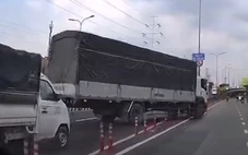 Xử phạt tài xế xe tải cán cọc tiêu chuyển làn sai quy định trên đường Đỗ Mười