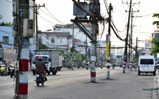 Vì sao 200 cột điện trên đường Nguyễn Thị Định chưa thể di dời?