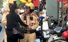 Cô gái giật biên bản của Cảnh sát giao thông Bàn Cờ do lo lắng mức phạt nên hành động bộc phát