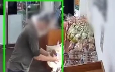 Trùm túi ni lông lên đầu né camera, người đàn ông trộm 50 ổ bánh mì
