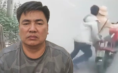 Tạm giữ hình sự tài xế đẩy cảnh sát giao thông vào đầu xe tải