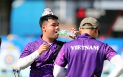 Đứng bắn giữa nắng chiều 32 độ C, cung thủ Việt Nam vào tranh HCV
