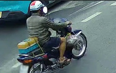 Người đàn ông phun sơn chữ 'Bắn tốc độ' trên mặt đường ở TP.HCM bị mời làm việc
