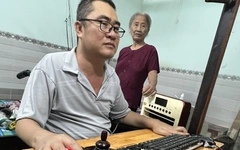 Người cha liệt tứ chi không đầu hàng số phận