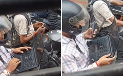 Dân mạng tranh cãi cảnh mở laptop làm việc khi dừng đèn đỏ