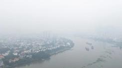 TP.HCM mù mịt sương, đề phòng mưa lớn kết hợp triều cường gây ngập nặng