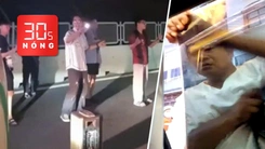 Bản tin 30s nóng: Kẹt xe, tài xế rủ nhau karaoke trên cao tốc; Làm rõ vụ đập phá kính taxi
